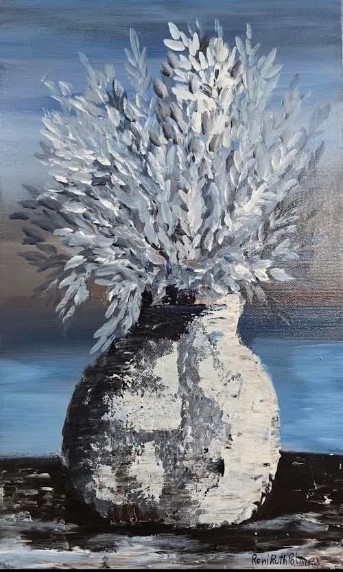 Vase with leafy branches